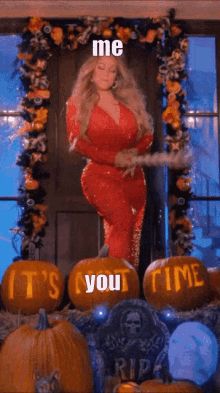 Mariah hitting some pumpkins with a candy cane baseball bat that have 
 “It’s not time” carved on them.