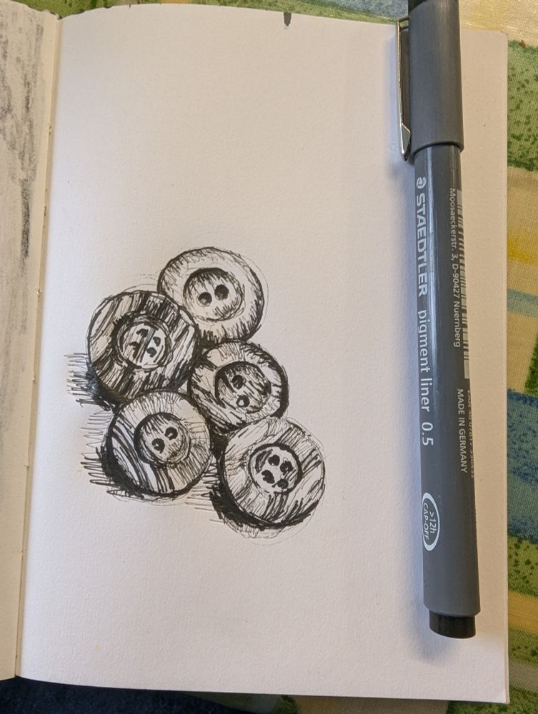 Pen drawing of 5 large , wooden buttons 