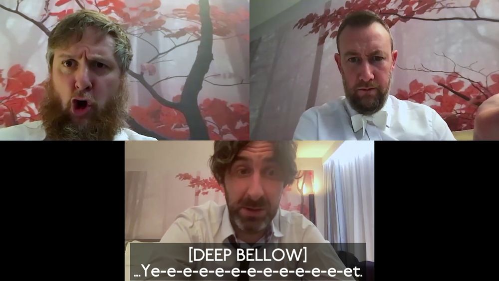 Screenshot of a Zoom call between three friends, playing a parlour game. Key is emitting a deep bellow saying "Yet." The subtitle has a lot of Es, he's really elongating that word.