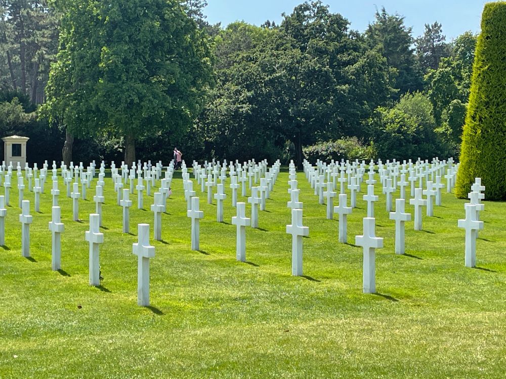 White graveyard crosses in Normandy of fallen US soldiers in WW II