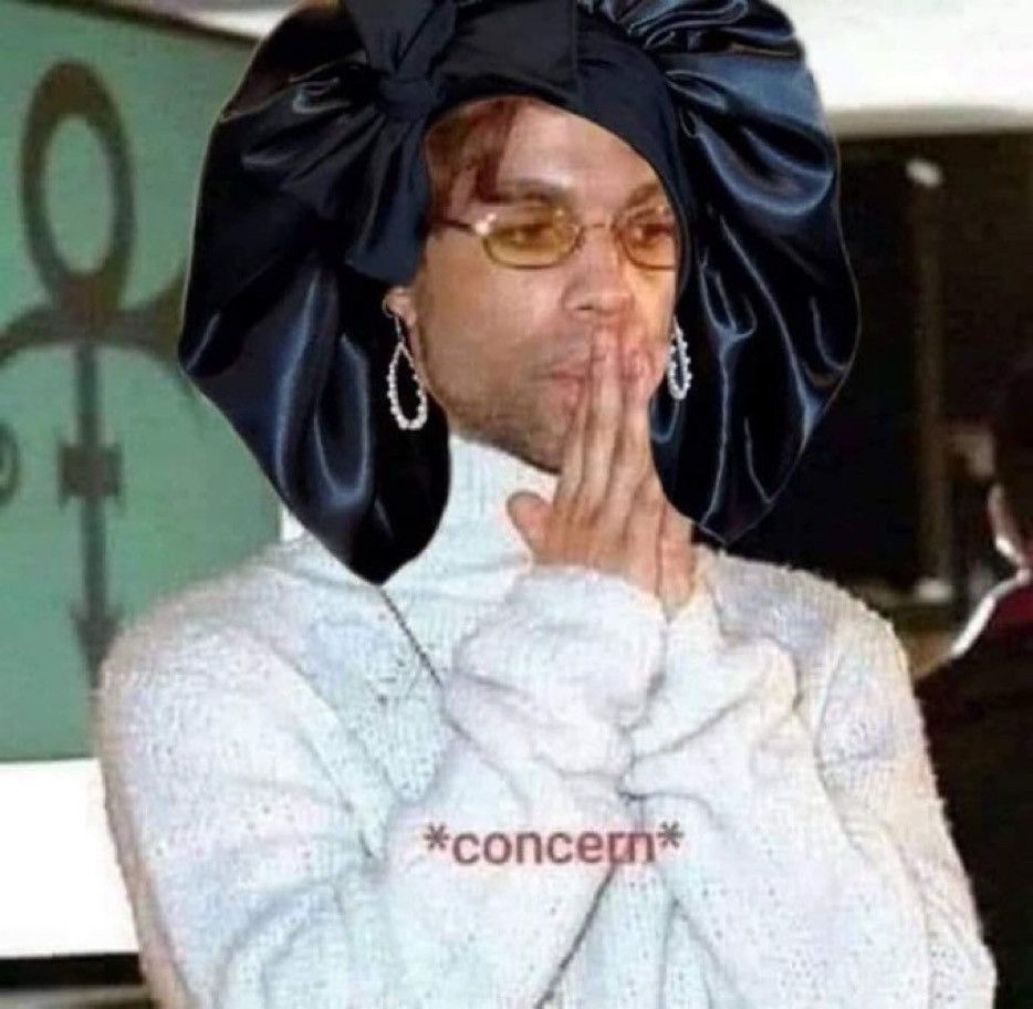 Image is of Prince with his hands covering his face. A bonnet has been added to his head. The image is captioned "concern" at the bottom.