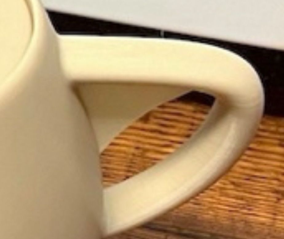 Handle of Newell’s Utah teapot but with an additional support?