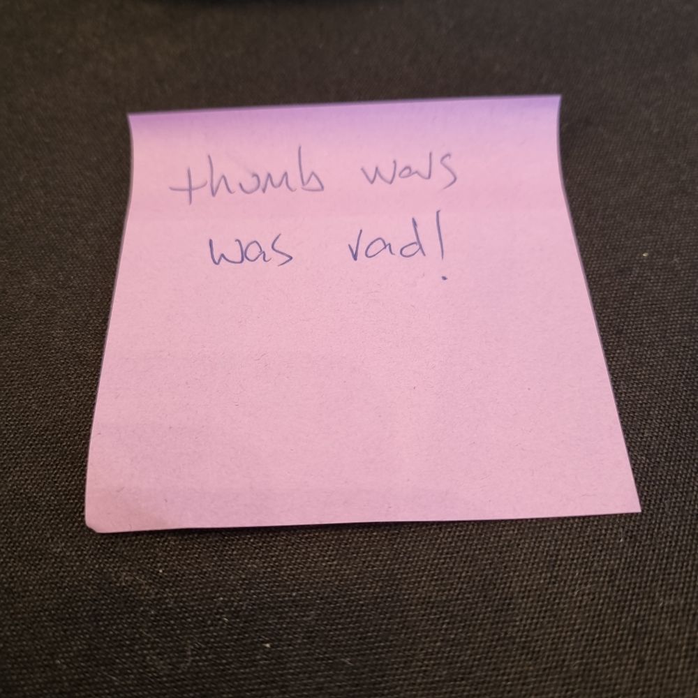Post it note with "thumb wars was rad!" written on it