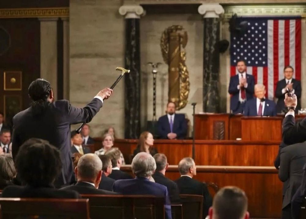 A photo of Representative Al Green at the State of the Union address. He is standing, pointing his cane at the dais, and shouting, "You have no mandate to cut Medicare!"

On the dais, Vice-President Vance and Speaker Johnson look on with what appears to be surprise or alarm, and President Trump leers smugly.

Representative Green was ejected from the Senate floor and later censured, but said he would gladly do it again, if it meant standing up for what he believes is right.