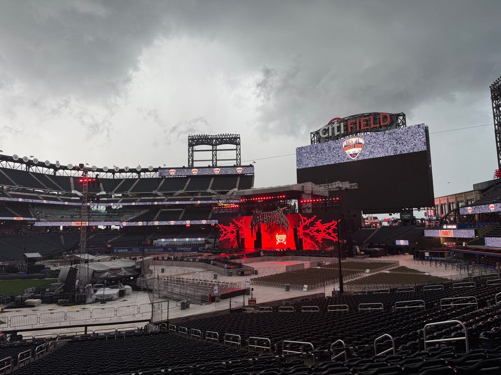Same Stray Kids stage, but the not blurry view from the top of the lower bowl, with all the seats and pits empty because of the rain delay. 