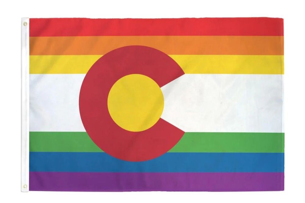 Colorado state flag, but where the colorado flag has three horizontal bands of blue, white, blue - this flag has the rainbow in place of the two blue bars.  The typical red "C" with a yellow center is superimposed over the rainbow background.