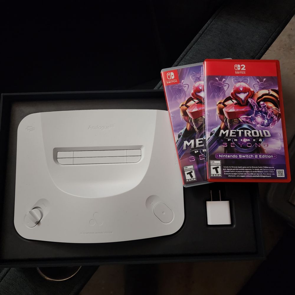 White Analogue3D system & both the Switch & Switch 2 physical copies of Metroid Prime 4 Beyond