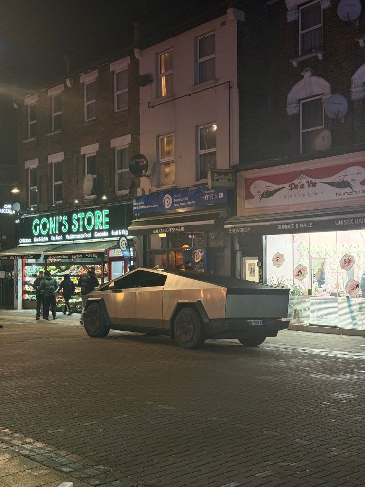 A Tesla cybertruck on a British high street 