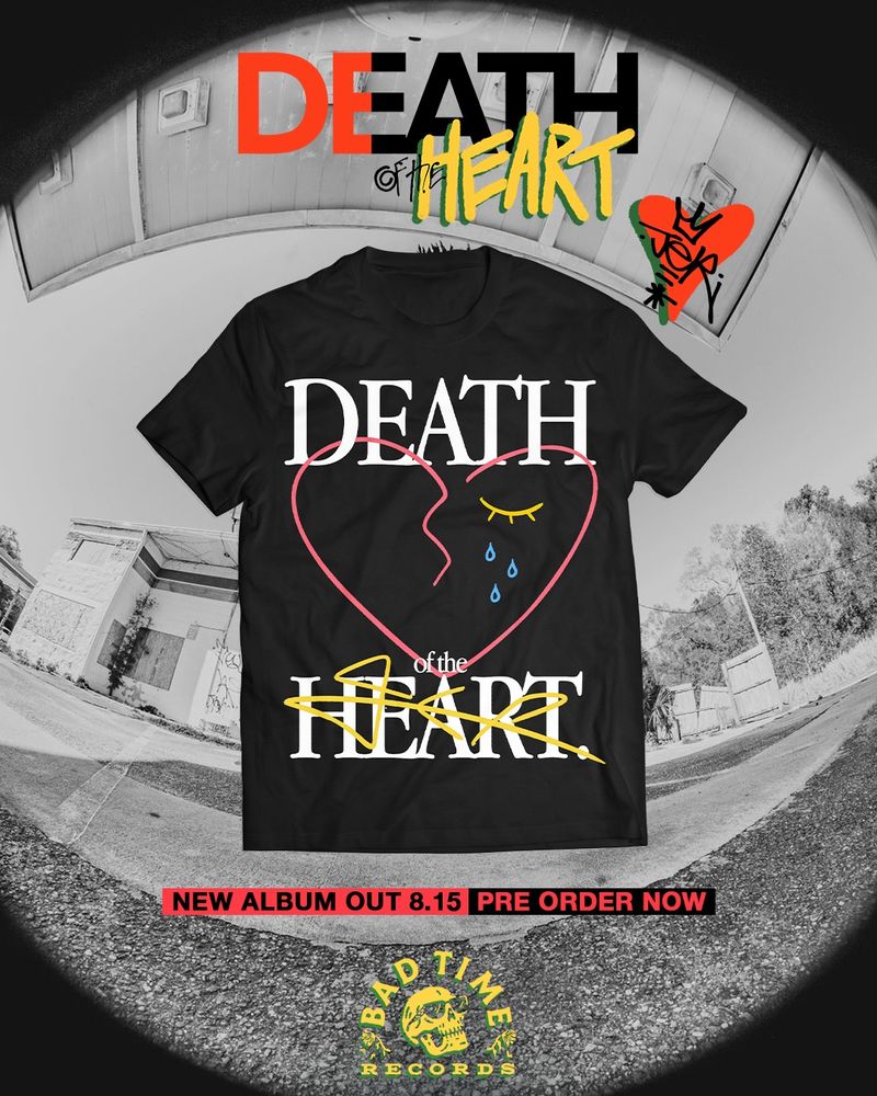 Black and white fisheye image with the death of the heart album title up top. Next to it is the  tag JER logo within a red heart with a green shadow. In the center of the image is a back shirt. The design features bold white text that reads DEATH up top and of the HEART at the bottom. Between the text is a simple illustration of a broken heart with one eye shedding tears. A JER tag sits over the word Heart. 

Below, text reads new album out 8.15. Preorder now. And below that is the bad time records logo 