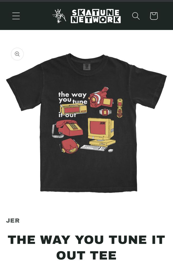 Screenshot from the skatune network webstore. The tune it out shirt is displayed over a white background. The tune it out shirt is black with a red, yellow, and white design. The design is vintage technology like. An old computer, alarm clock, phone camcorder, etc all arranged with the text “the way you tune it out” in the top left corner 

Under the shirt is the name JER followed by the text reading “the way you tune it out tee” 