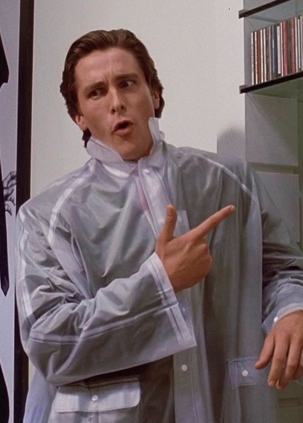 Patrick Bateman doing "check my dubs" pose