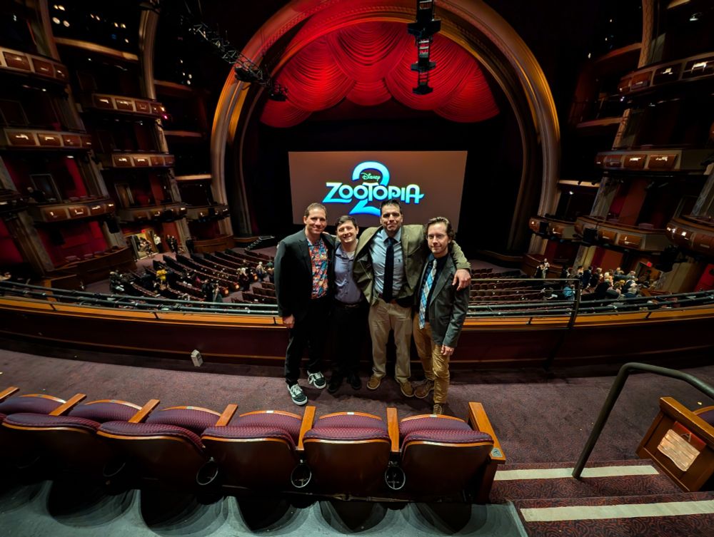 Getting our photo taken at the zootopia 2 wrap party after watching the movie at the Dolby theatre.