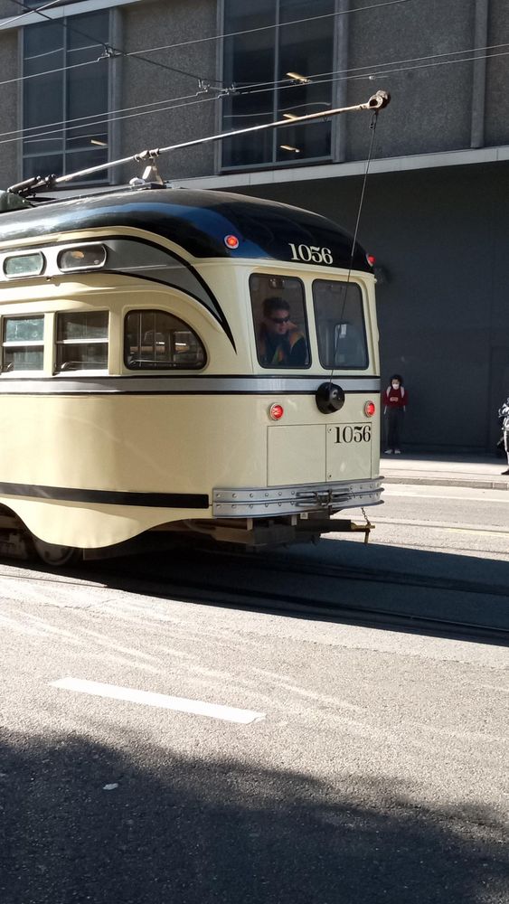 backing up.  the motorman is running the car from a secret second controller that's hidden under the seats at the rear end of the car.