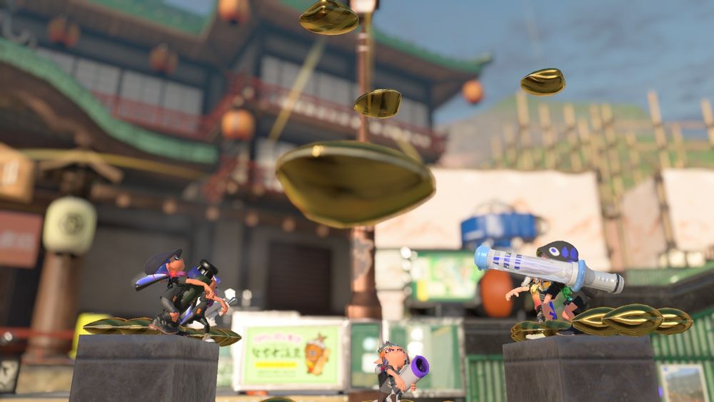 An image in which the members of TVA are standing in a circle, throwing Clams in the air