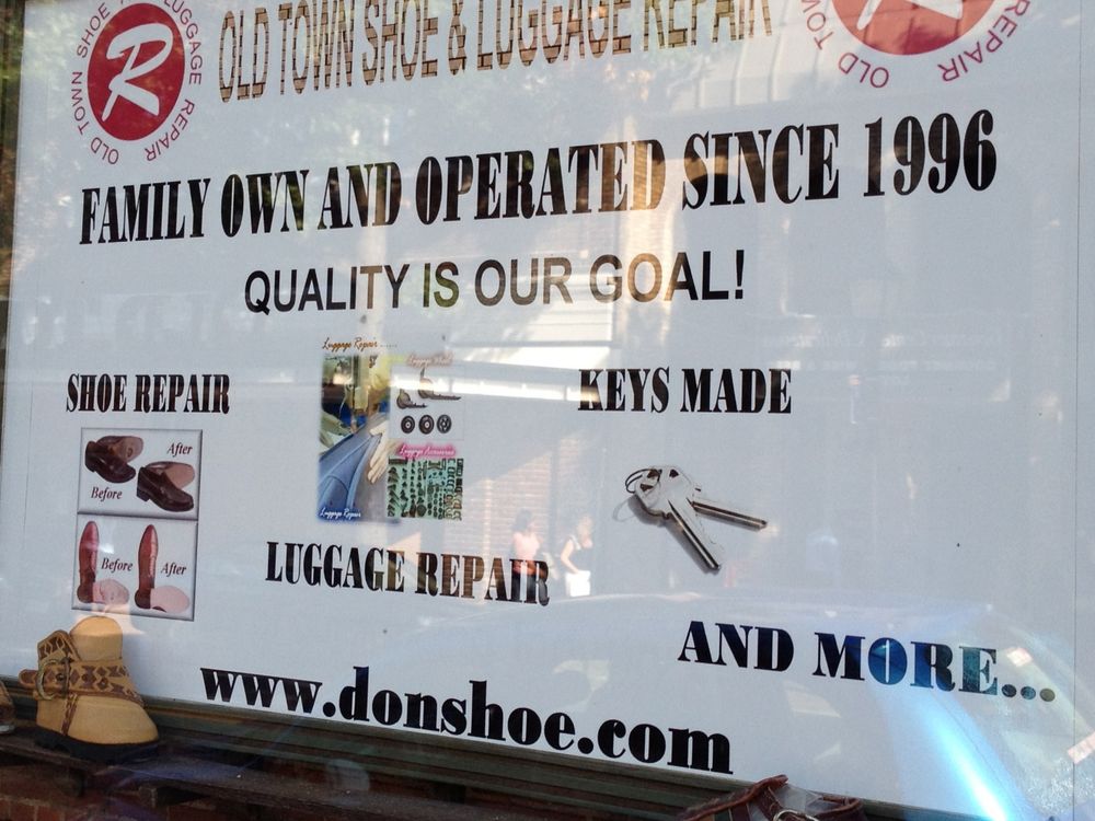 Storefront window sign says "Family owned and operated since 1996. Quality is our goal! Shoe repair, luggage repair, keys made and more."