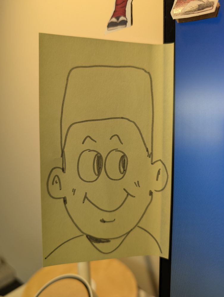 a cute doodle of me (Mike) on a yellow post-it note drawn by Ian