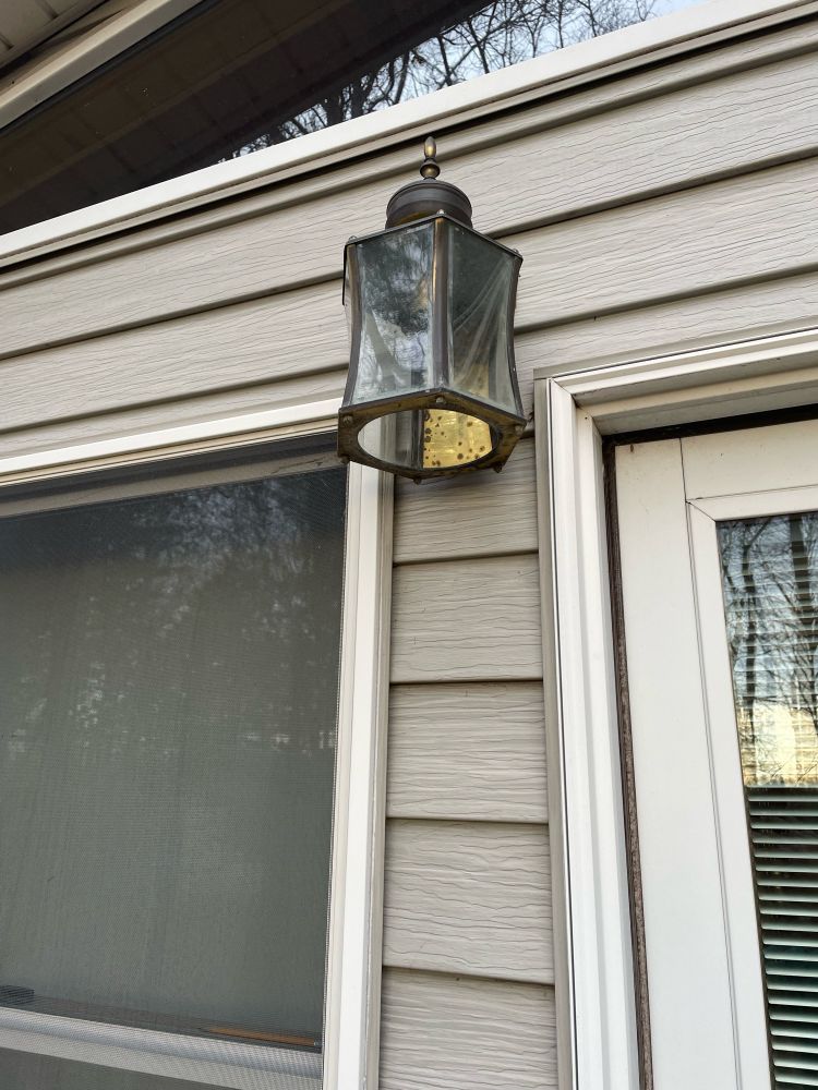 The ass ugly light fixture that used to be on the back of the house