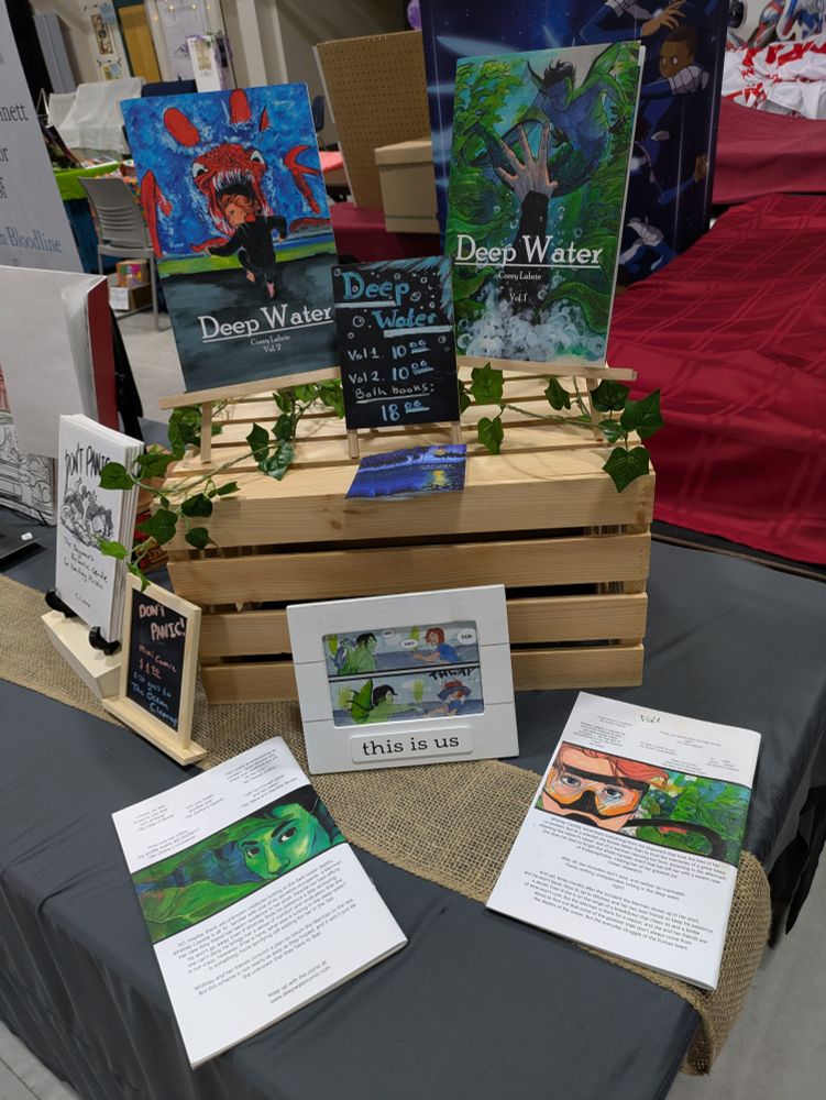 Picture of my comic book Deep Water volume 1 & 2 for same at my booth!