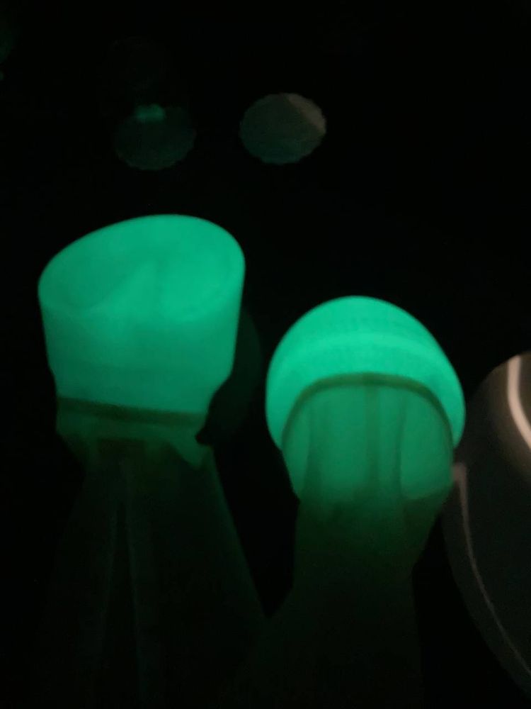 Glowing hooves in the dark, with green light coming out of them