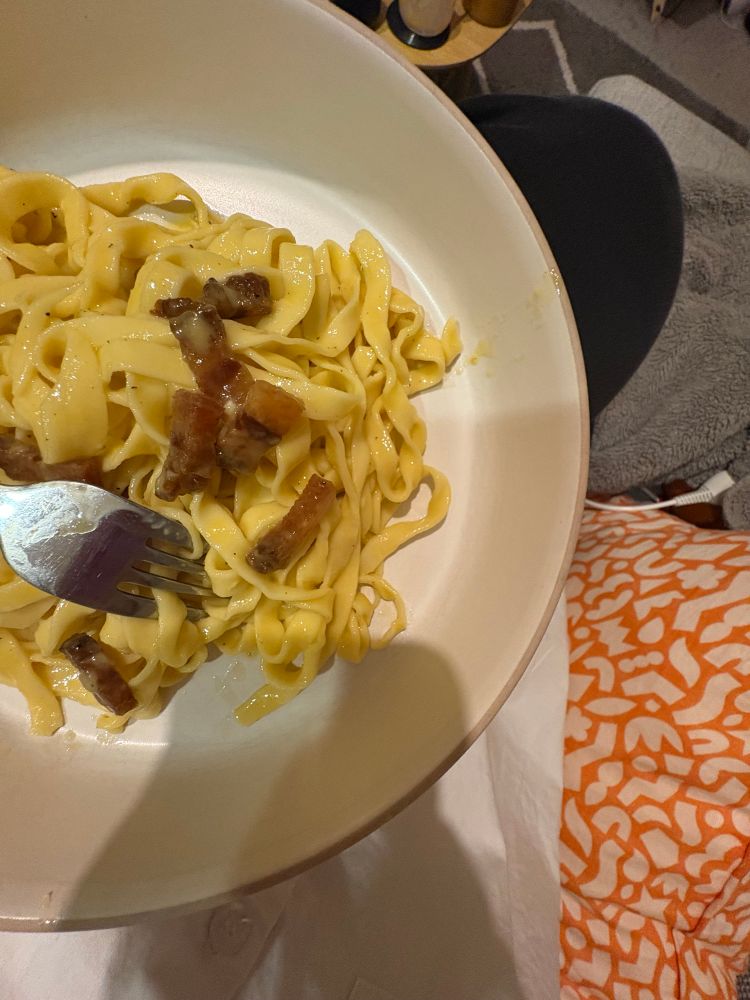 Hand-made carbonara pasta photographed from above