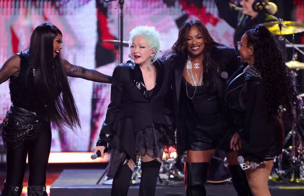 Cyndi Lauper and Salt-N-Pepa together onstage at the Rock Hall of Fame Induction.