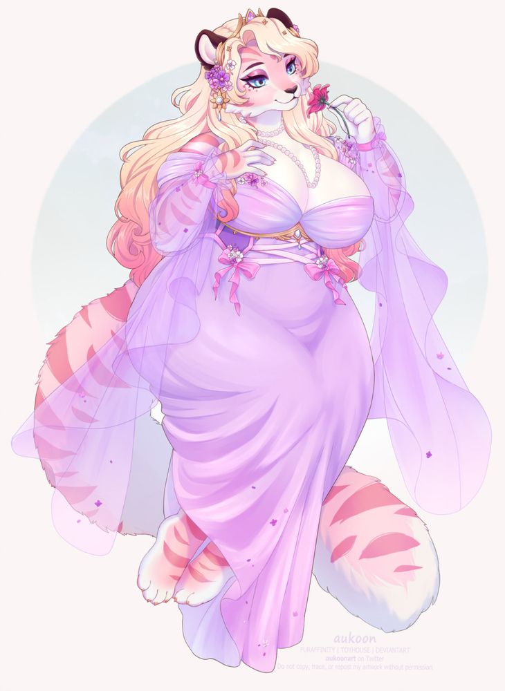 The pink tiger Marzipan in a lilac dress smelling a flower.