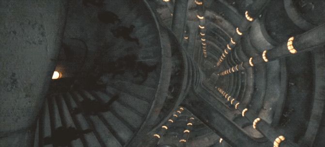 crowds running down the spiral stairs in Silo 