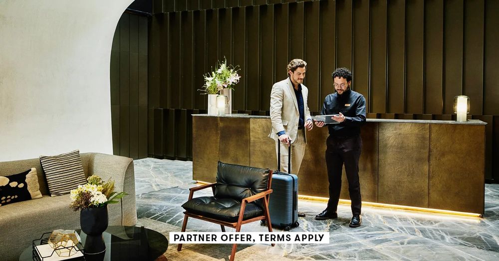 20250715_SOCIAL-DISCLAIMER_PARTER-OFFER-TERMS-APPLY_HOTEL-MANAGER-CHECKING-IN-BUSINESSMAN-INTO-HOTEL-USING-TABLET_Thomas-Barwick.jpg?ssl=1