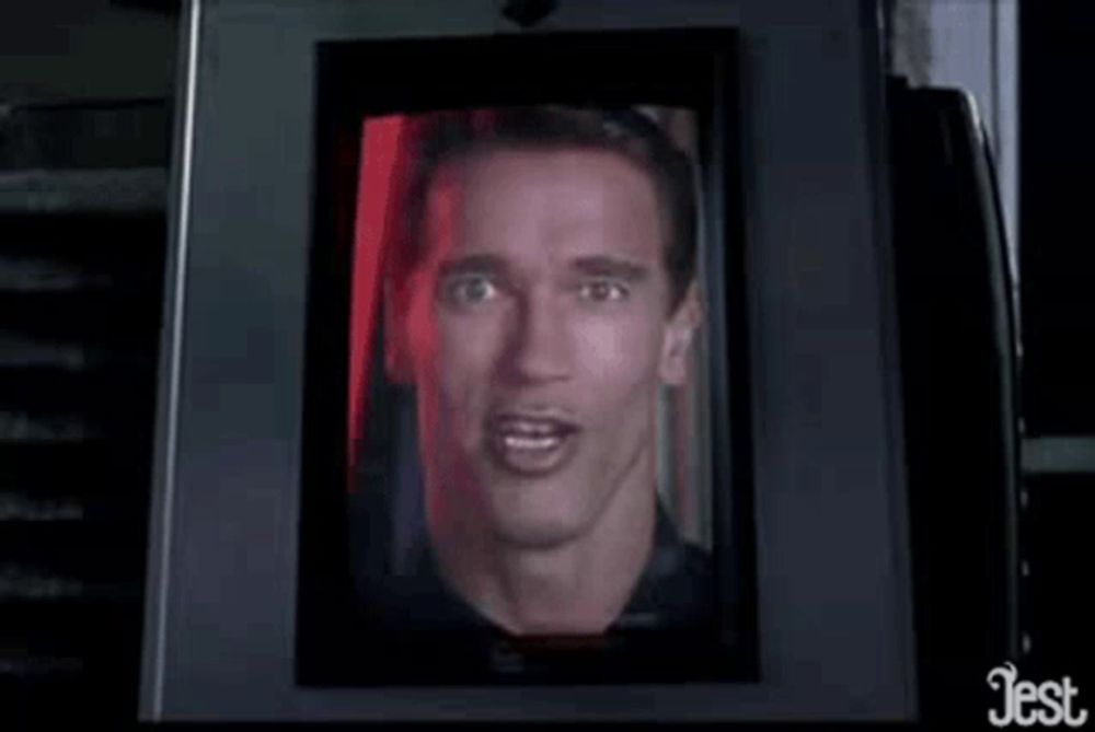 a picture of arnold schwarzenegger is displayed on a computer screen .