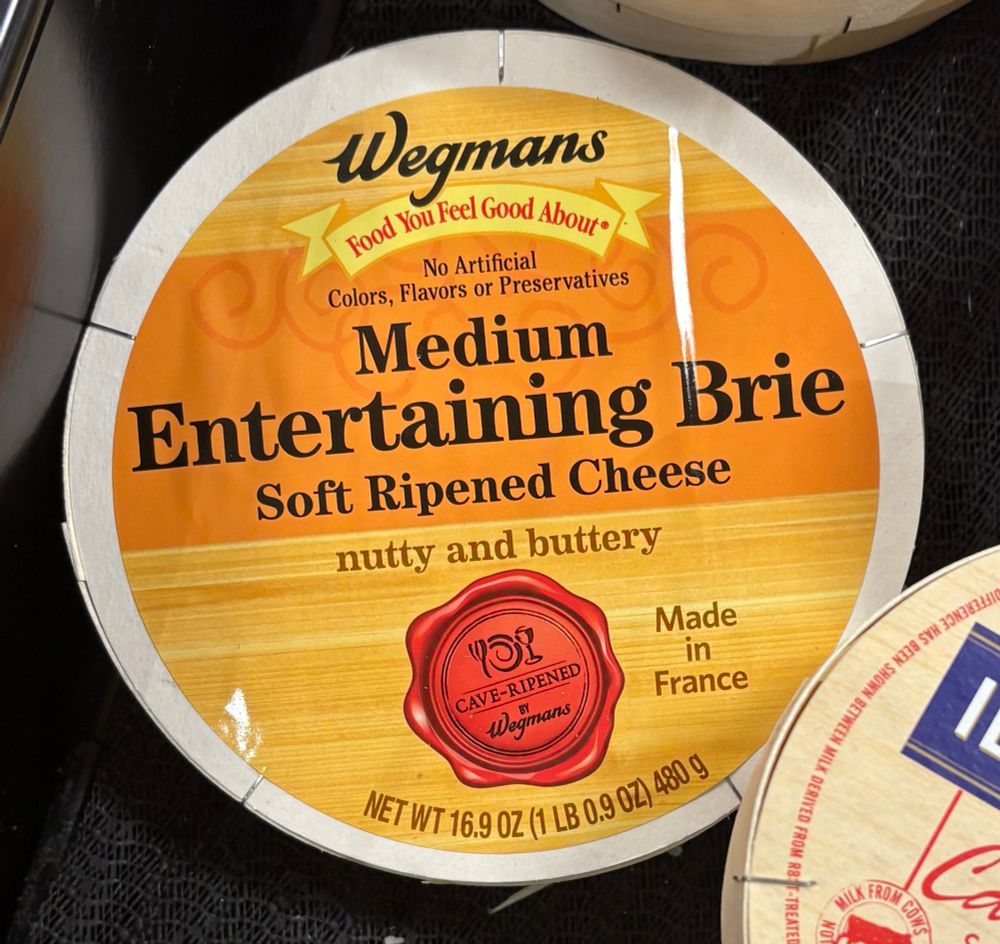 Brie from Wegmans store labeled Medium Entertaining Brie