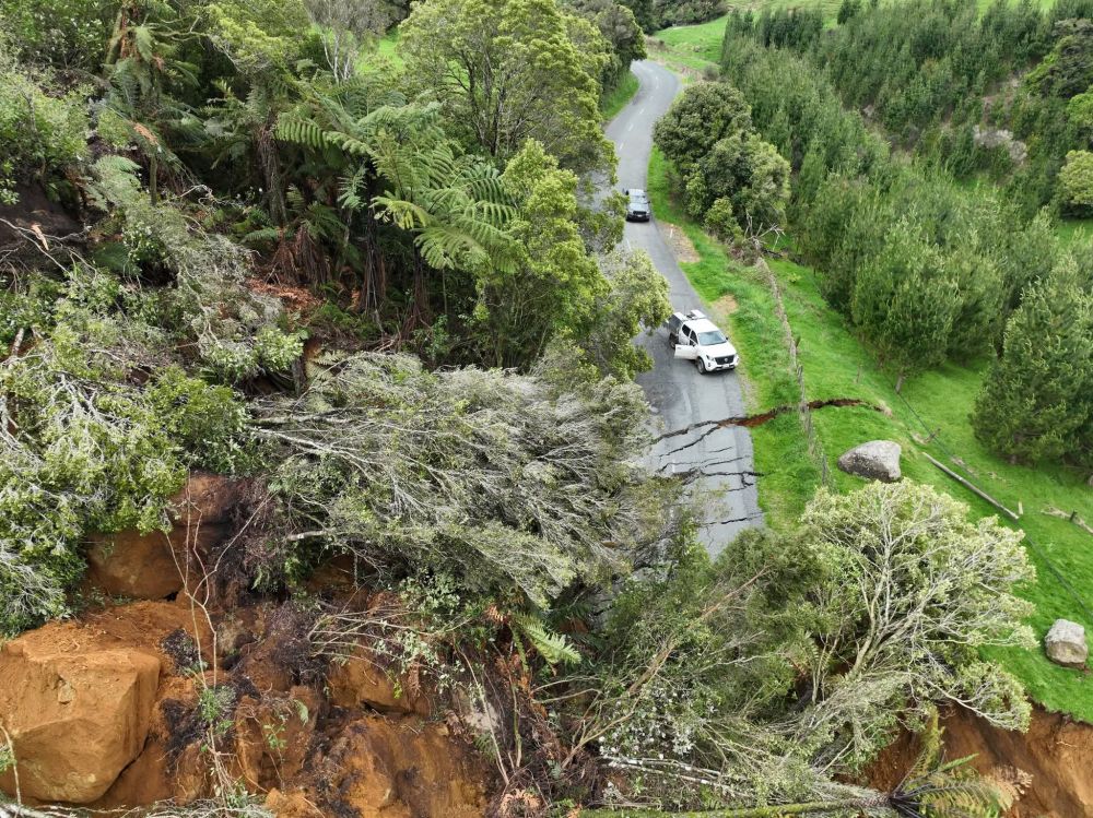 A large slip that has taken out a road.
