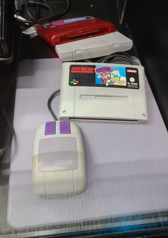 Mario Paint cartridge, mouse and mouse pad for the Super Nintendo, 1992, as displayed in OXO Museo del Videojuego, Madrid