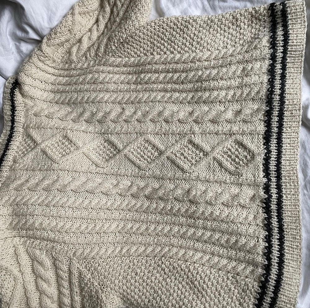 The backside of the cardigan