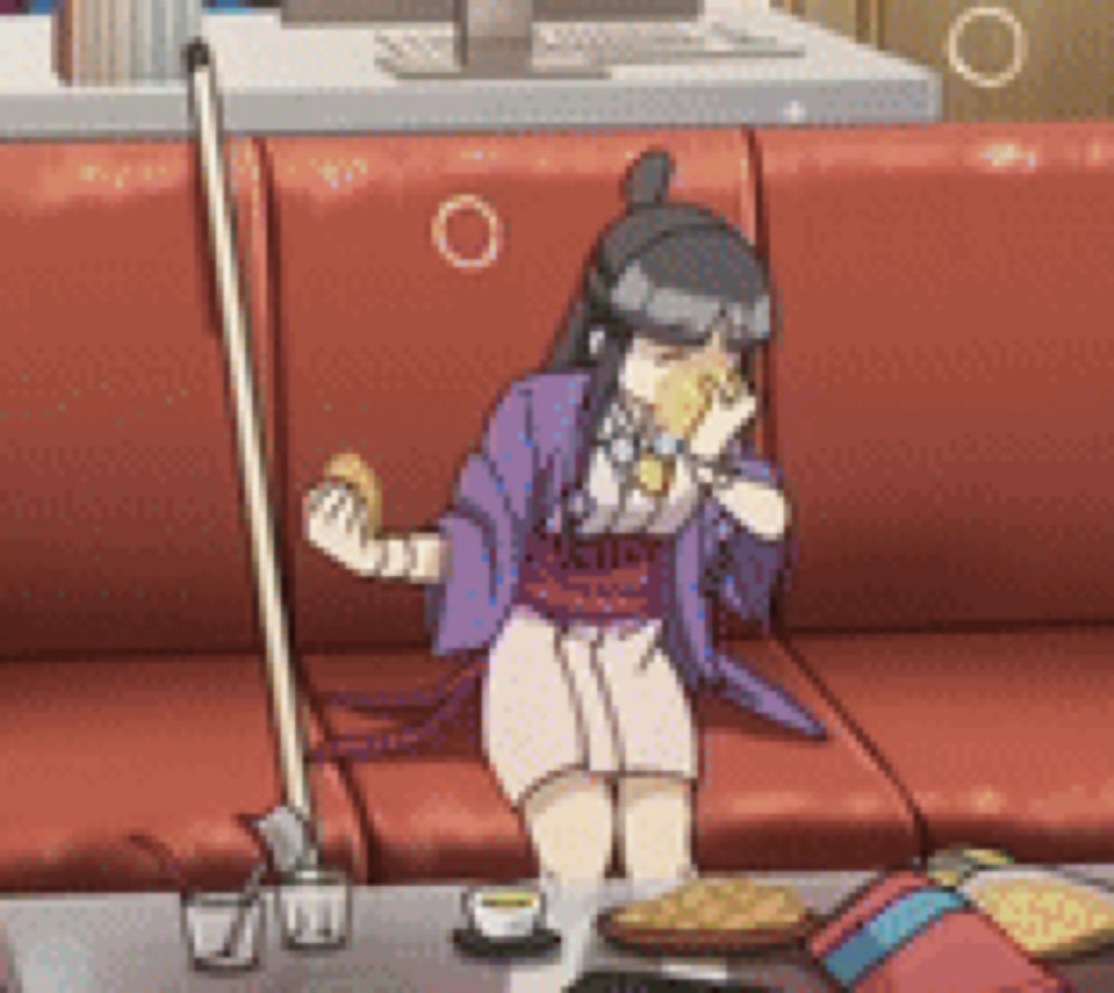 a cartoon girl is sitting on a red couch holding a broom .