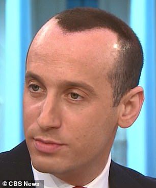 Photo of Stephen Miller who is actually 100 Nazi bats in a human skin suit sporting spray on hair that could only look more fake if he’d forgotten to remove the painter’s tape from his giant fucking forehead.