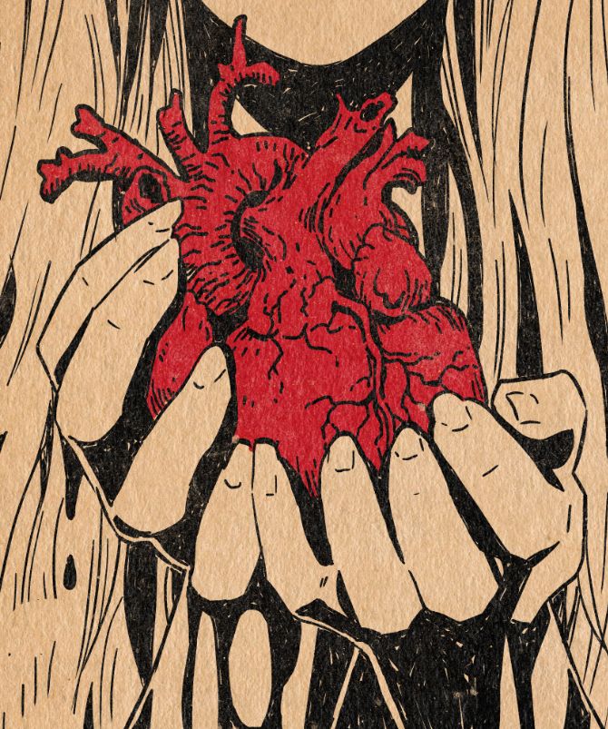 someone holding a heart in their hands