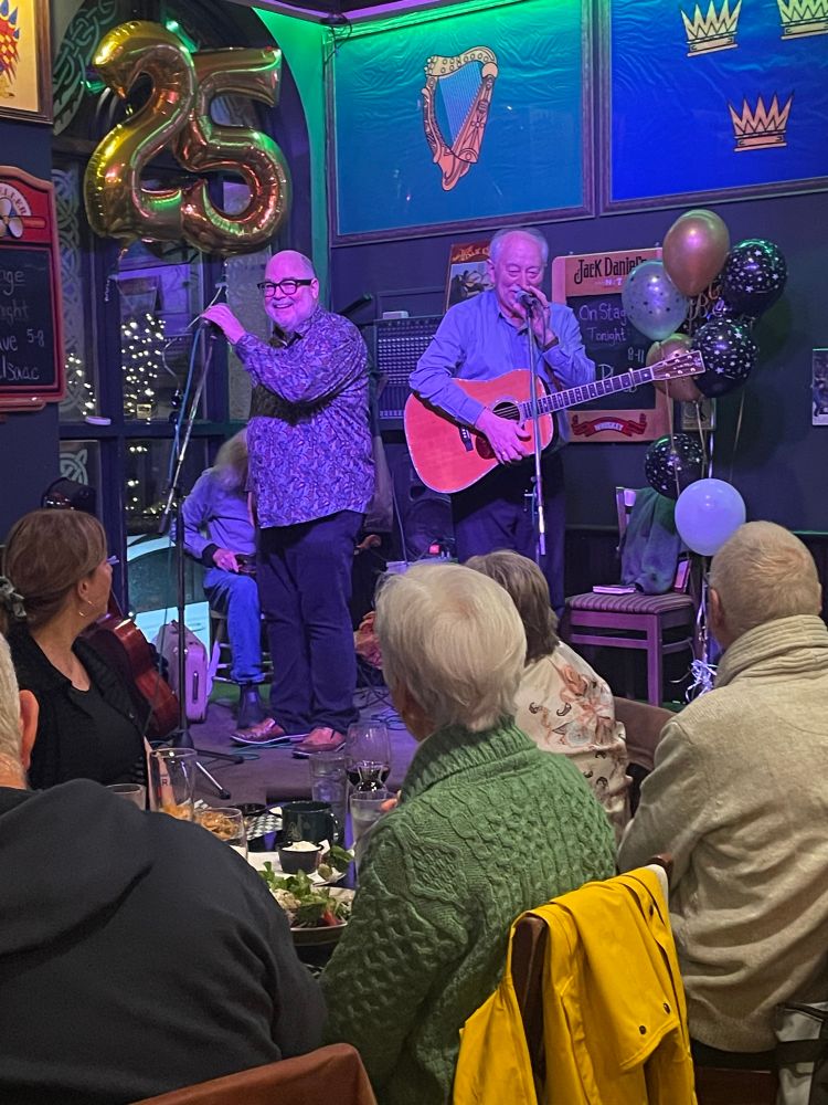 Two Irish musicians on stage 