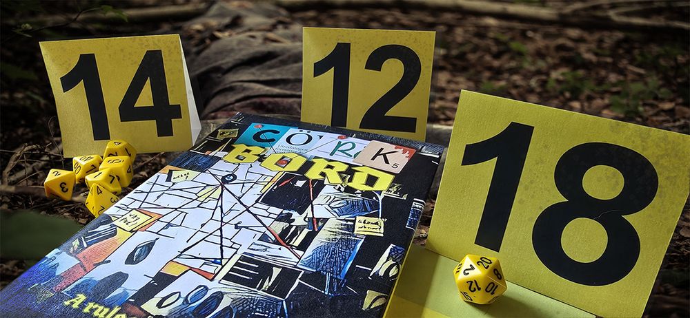 Close-up of a crime scene-style evidence setup in an outdoor forest setting featuring yellow numbered markers 12, 14, and 18, a colourful 'Cork Board' investigation-themed game box with a map and strings design, and bright yellow polyhedral dice, including a 20-sided die, arranged on dirt and leaves.