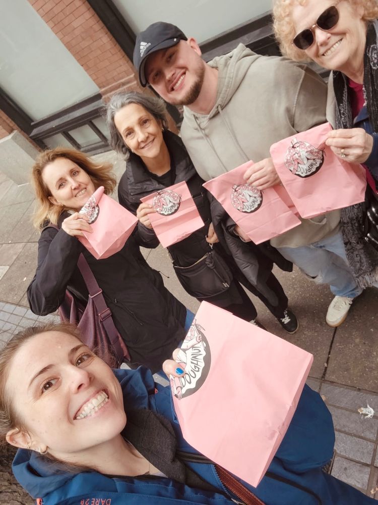 SETAC staff posing with Voodoo Doughnut bags