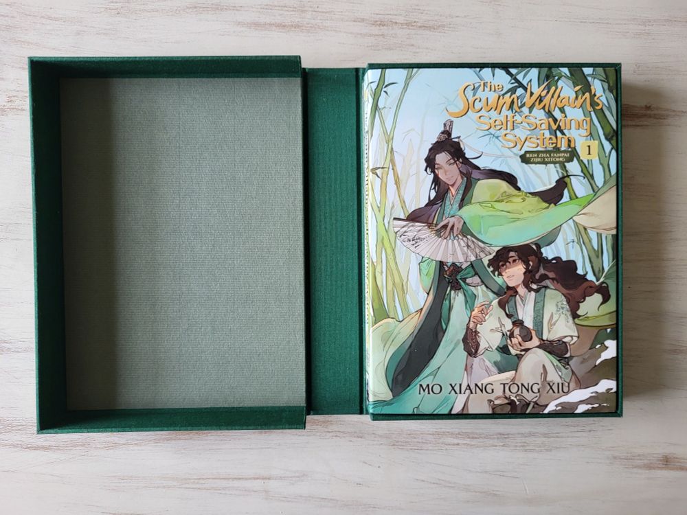 Full view of box interior with book inside.