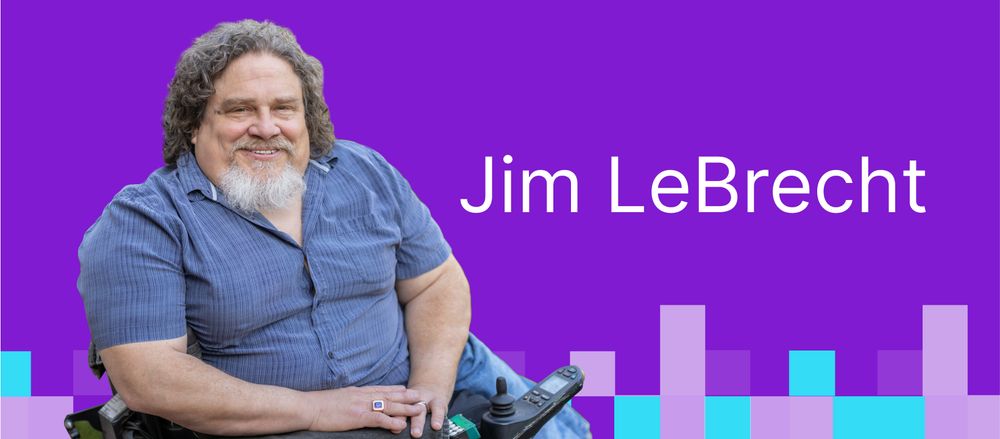 Jim LeBrecht axe-con 2025 keynote speaker: a white man in 60s with goatee who is a wheelchair user