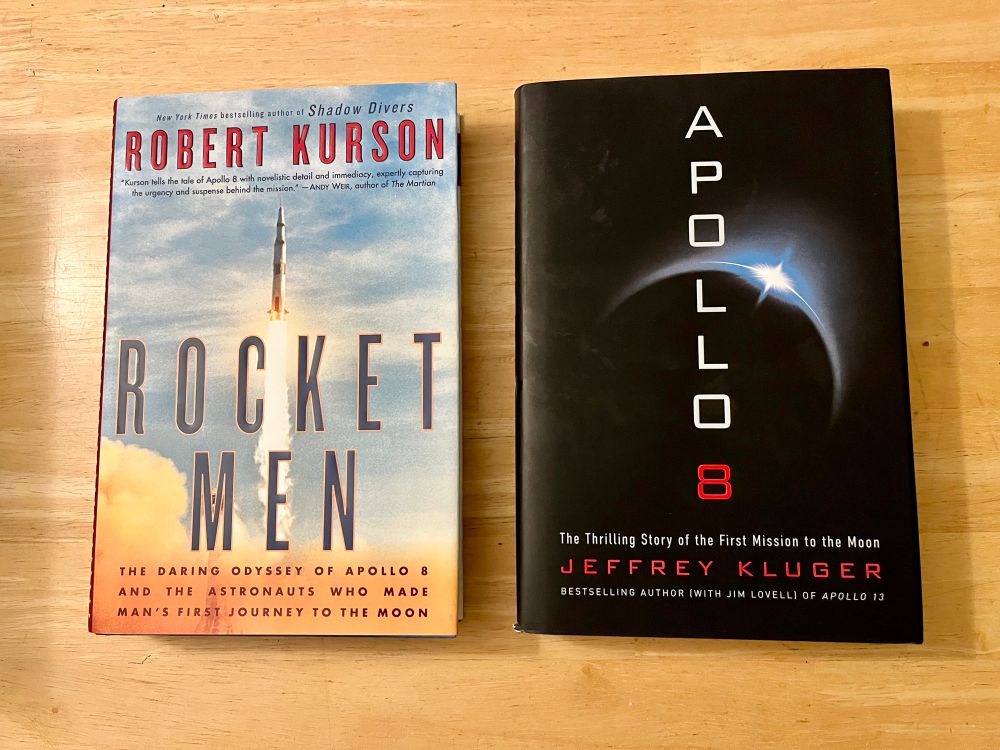 Two books.
LH. The Rocket Men, Robert Kurson, Random House 2018
RH Apollo 8, Jeffrey Kluger, Henry Holt & Co. 2017