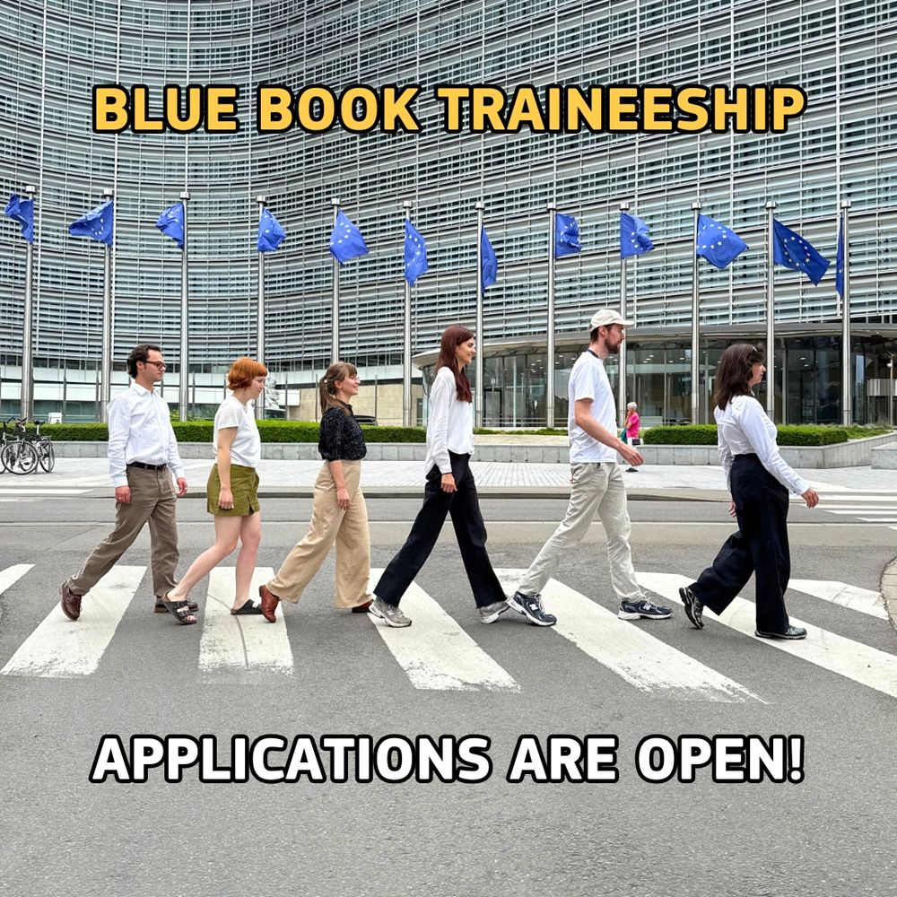 Six Blue Book Trainees are walking across a zebra crossing in front of the European Commission building in Brussels. EU flags are visible in the background. Bold yellow text at the top reads "BLUE BOOK TRAINEESHIP" and bold white text at the bottom reads "APPLICATIONS ARE OPEN!"