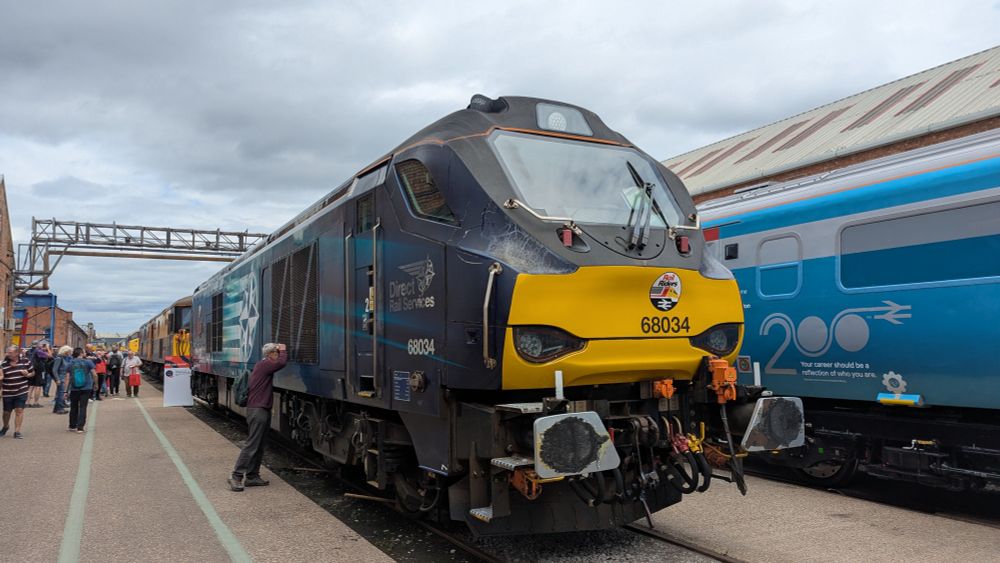 A class 66 locomotive in a depot siding
