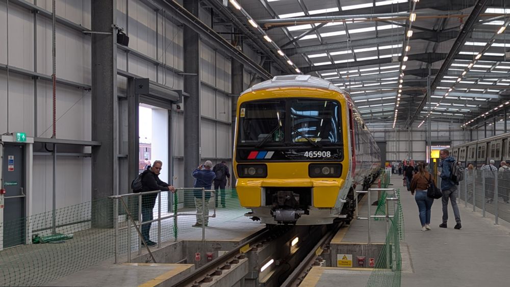 A class 465 EMU train in a depot shed