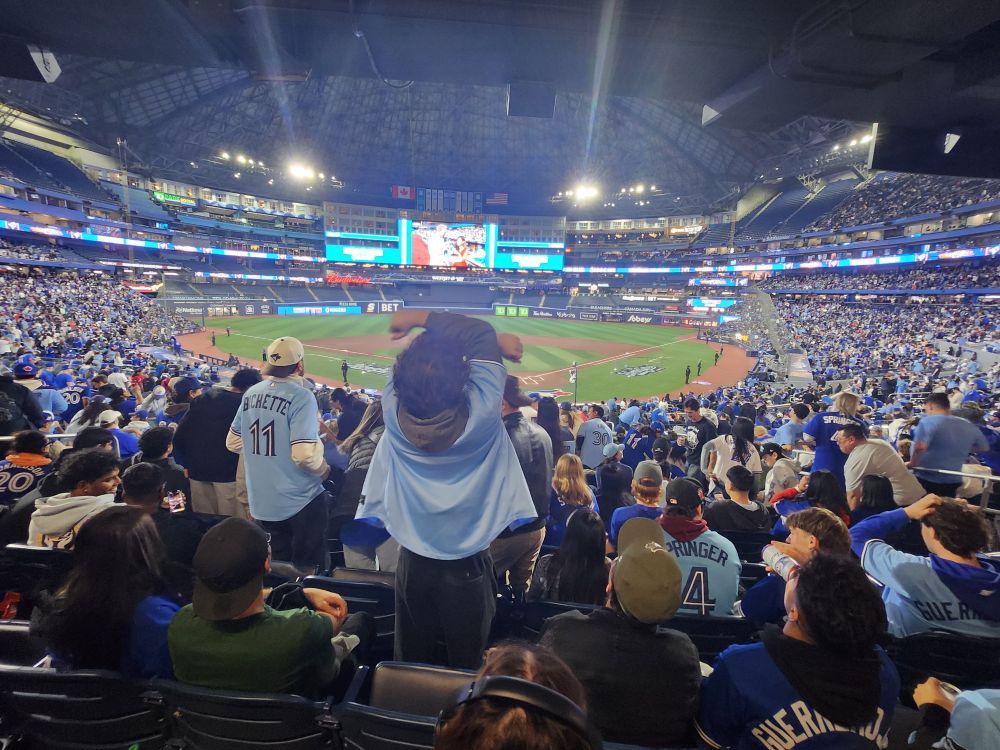 Photo shows Blue Jays fans at Rogers Centre during the Game 4 World Series watch party.