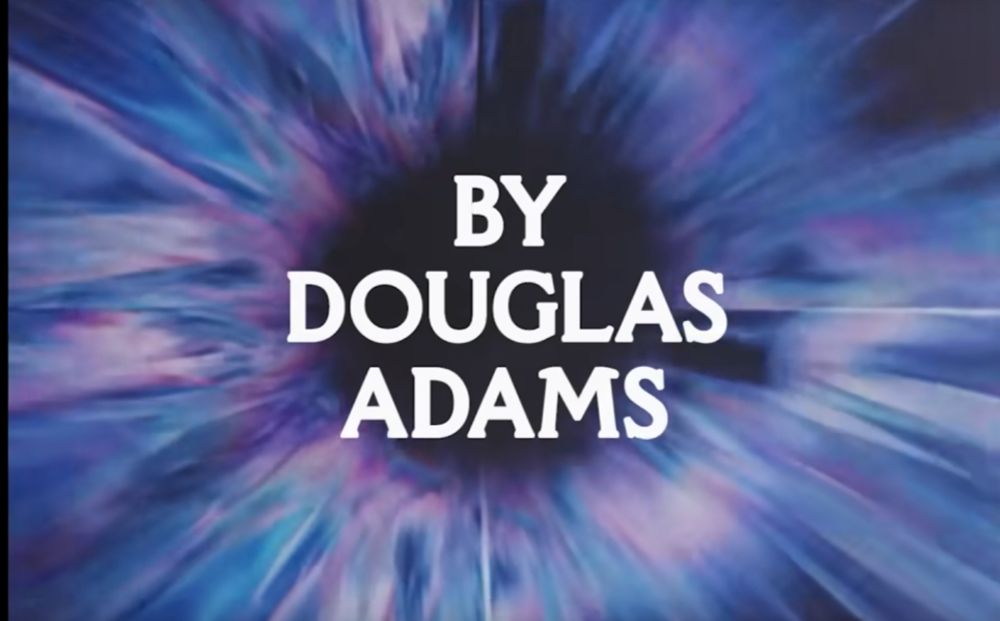 (By Douglas Adams) written in white with a blue and black mirror otherworldly background. 