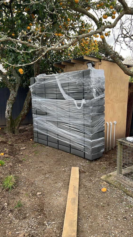 A 2000 litre slim water tank. It’s rectangular, 500mm deep, 2400mm long and 1900mm high. 
