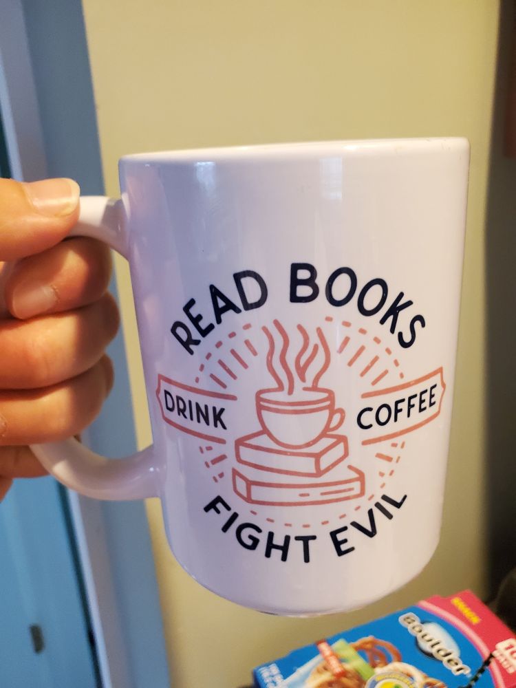 Coffee mug with a graphic that says Read books drink coffee fight evil 