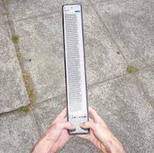 meme of a person holding an extra long phone to type/read an extra long message 